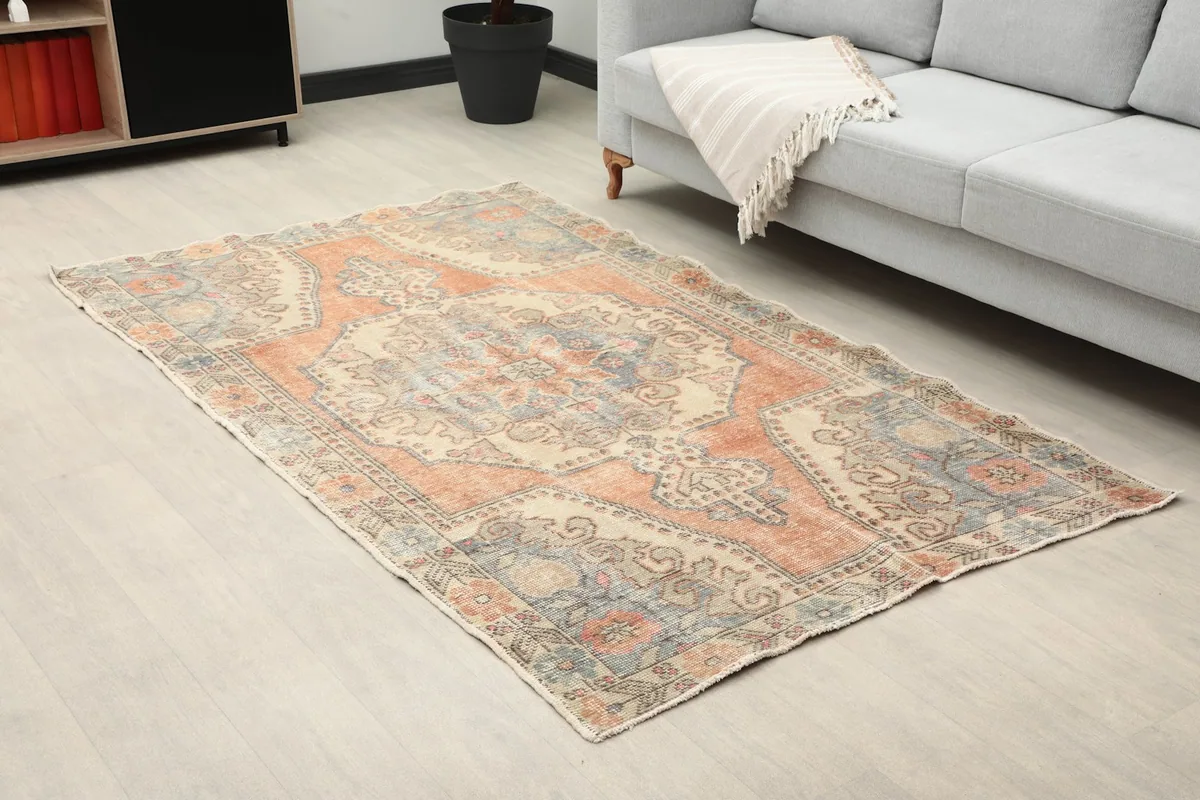 Close-up room view of the rug's patterns and colors in a living space