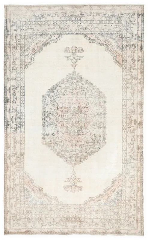 Full top view of the 6'4" x 10'7" ivory vintage Anatolian rug with a central medallion and geometric patterns.