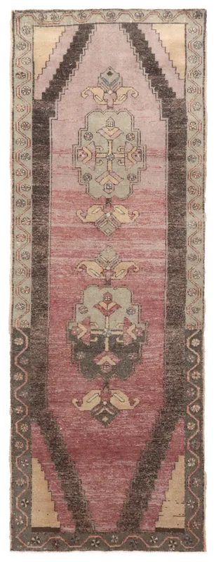 Full top view of the 3'3" x 9'2" rose and charcoal geometric Anatolian runner rug