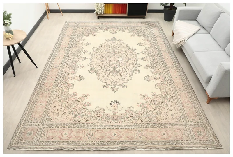 Full overhead view of the large 8x12 ivory and rose Anatolian vintage area rug