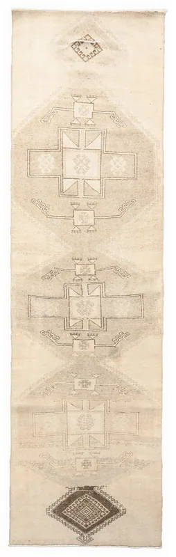Full top view of the 3'2" x 11'3" beige and brown geometric Anatolian runner rug on a white background.