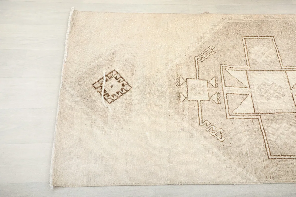 Angle view of the other end of the runner, showing the subtle wear and design details.