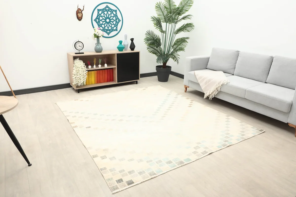 Angle view of the ivory vintage rug placed in a modern living space