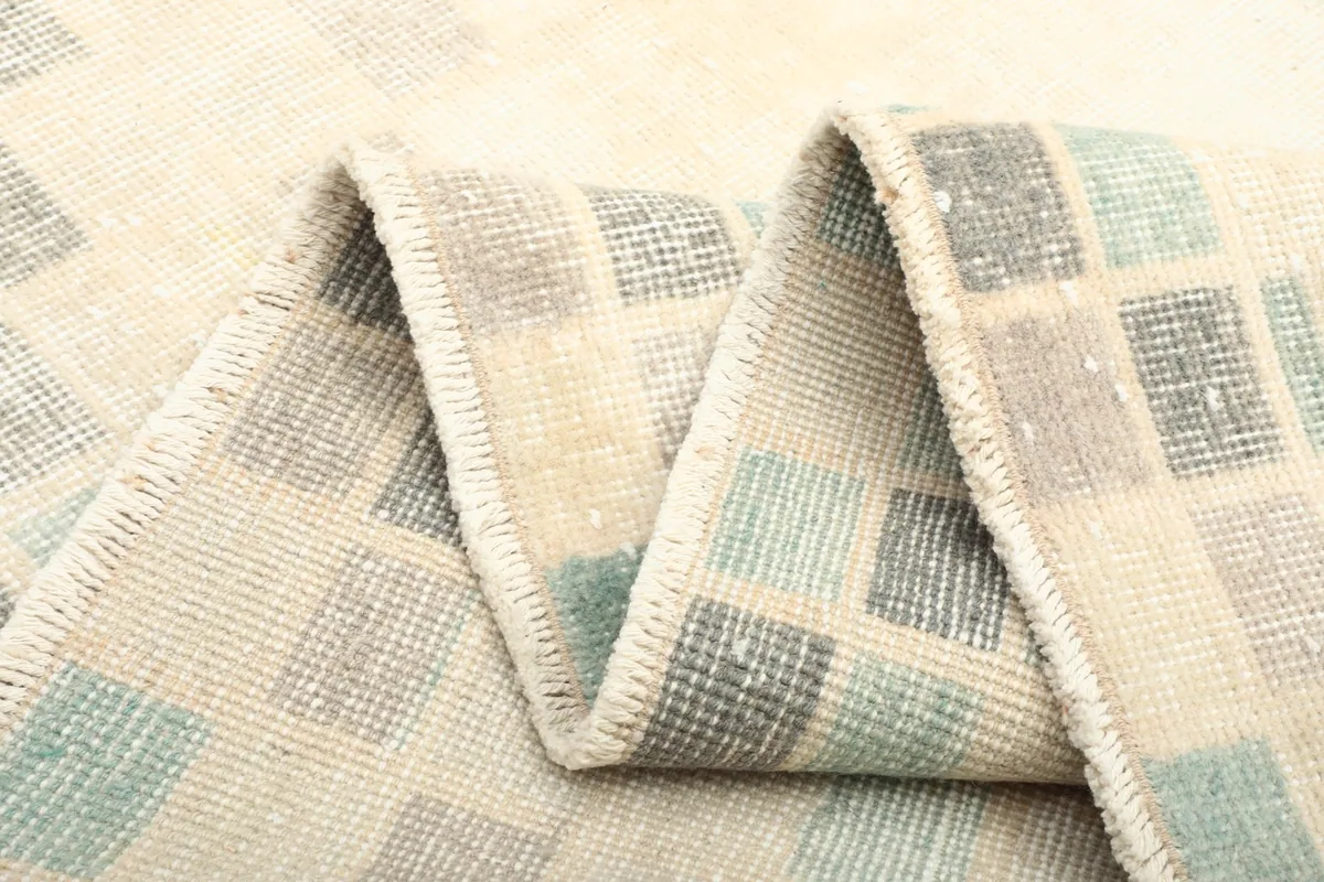 Folded section of the rug, showing the density of the hand-knotted construction