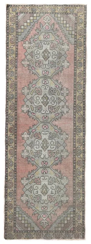 Full overhead view of the rose tribal geometric vintage runner on a white background.