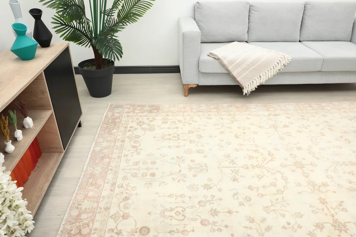 Another room view of the rug, providing perspective on its size and placement next to furniture