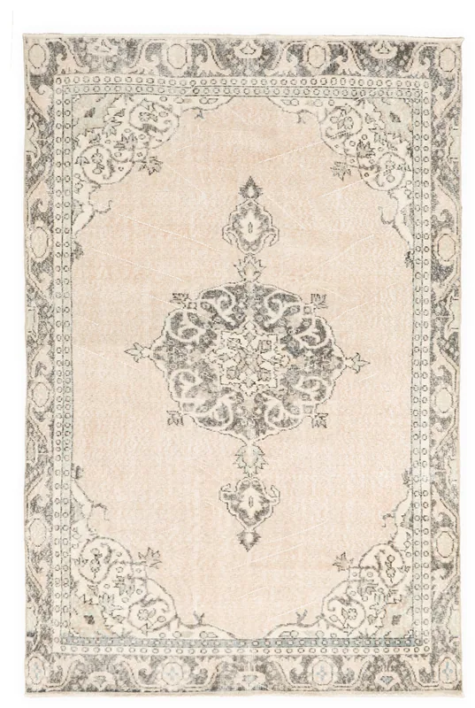Full top view of the 5'6" x 8'6" beige and charcoal vintage Anatolian area rug