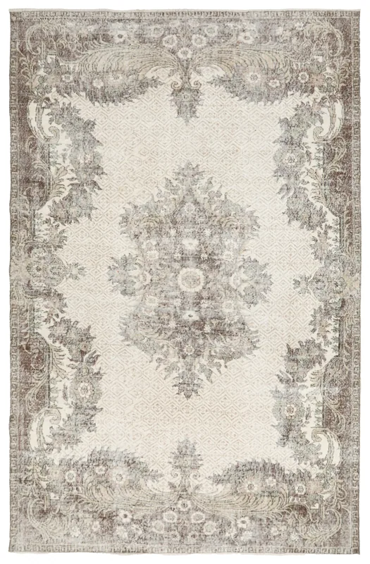 Full top view of the 7'2" x 10'11" ivory and brown vintage Anatolian area rug
