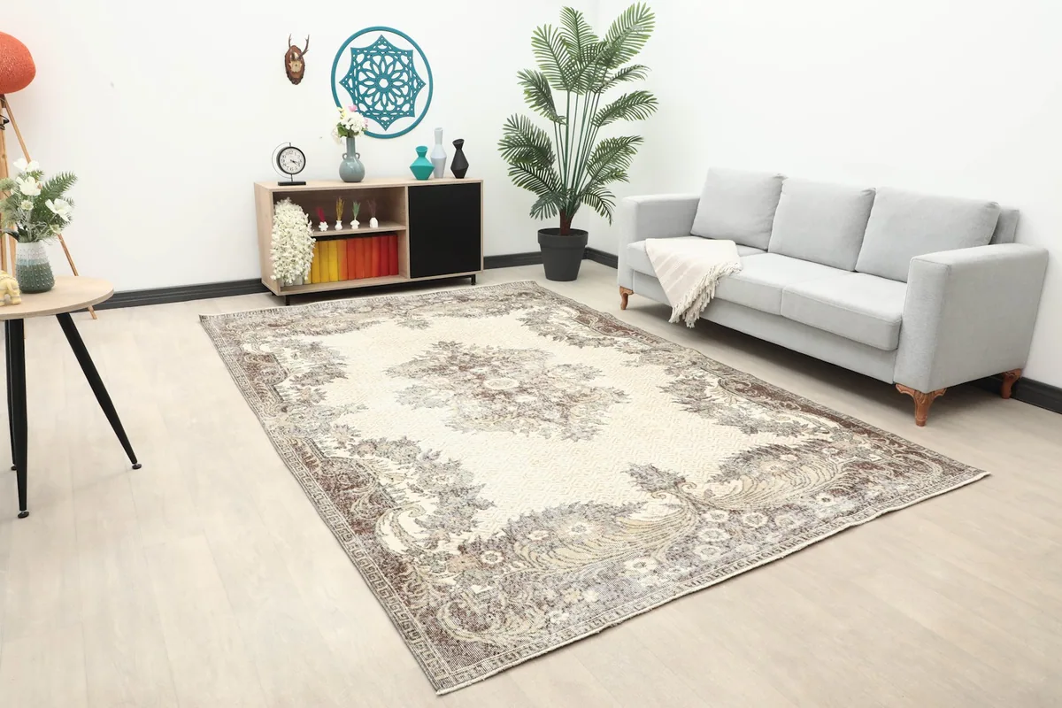 Angled view of the large ivory and brown rug complementing modern home decor