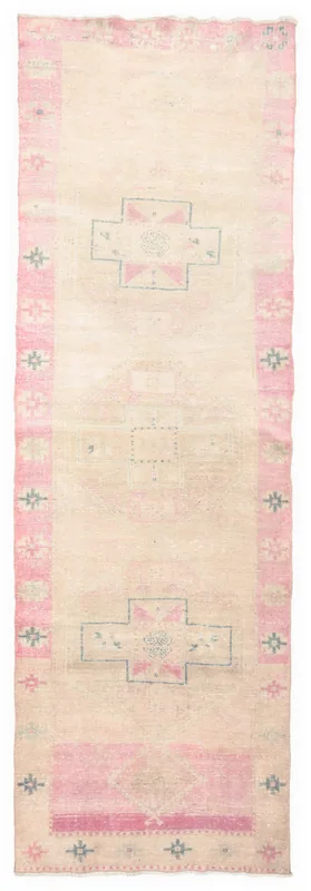 Top view of the 4x13 beige and rose vintage Anatolian runner with geometric motifs