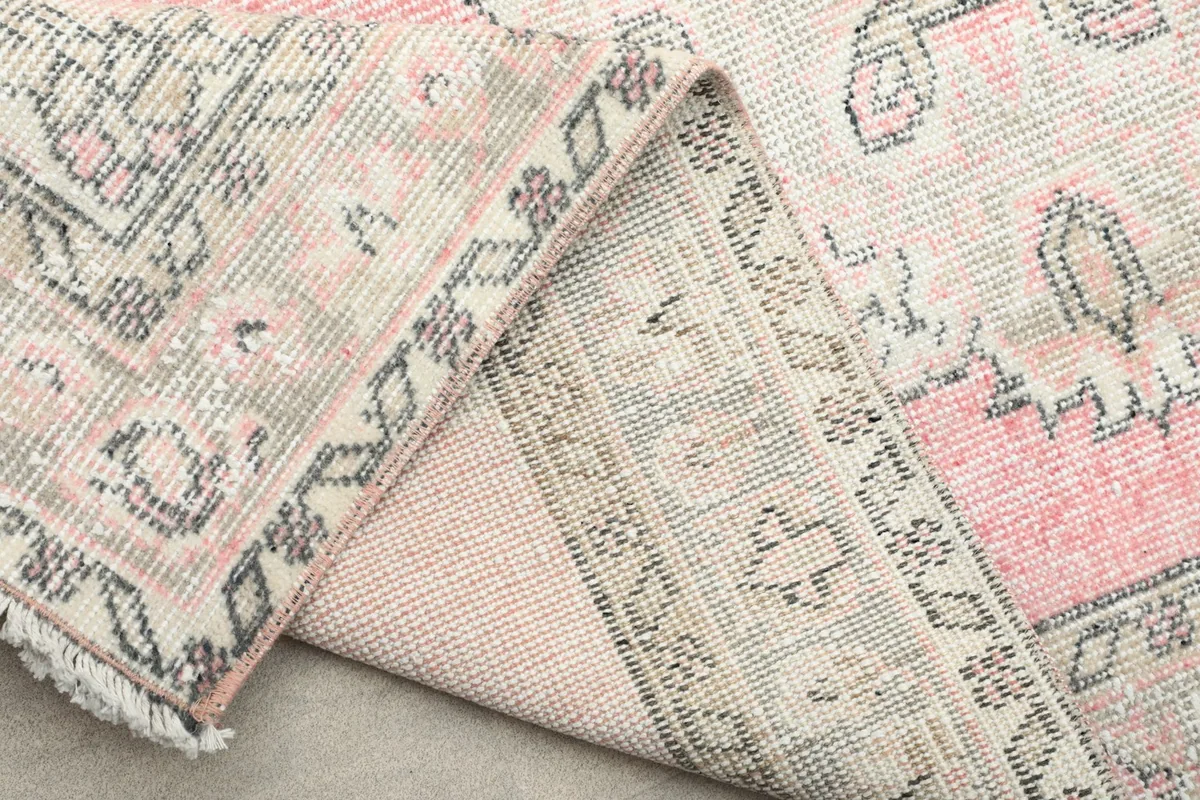 Another view of the rug's back, revealing the tight weave and construction