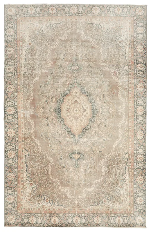 Full overhead view of the beige medallion floral vintage area rug