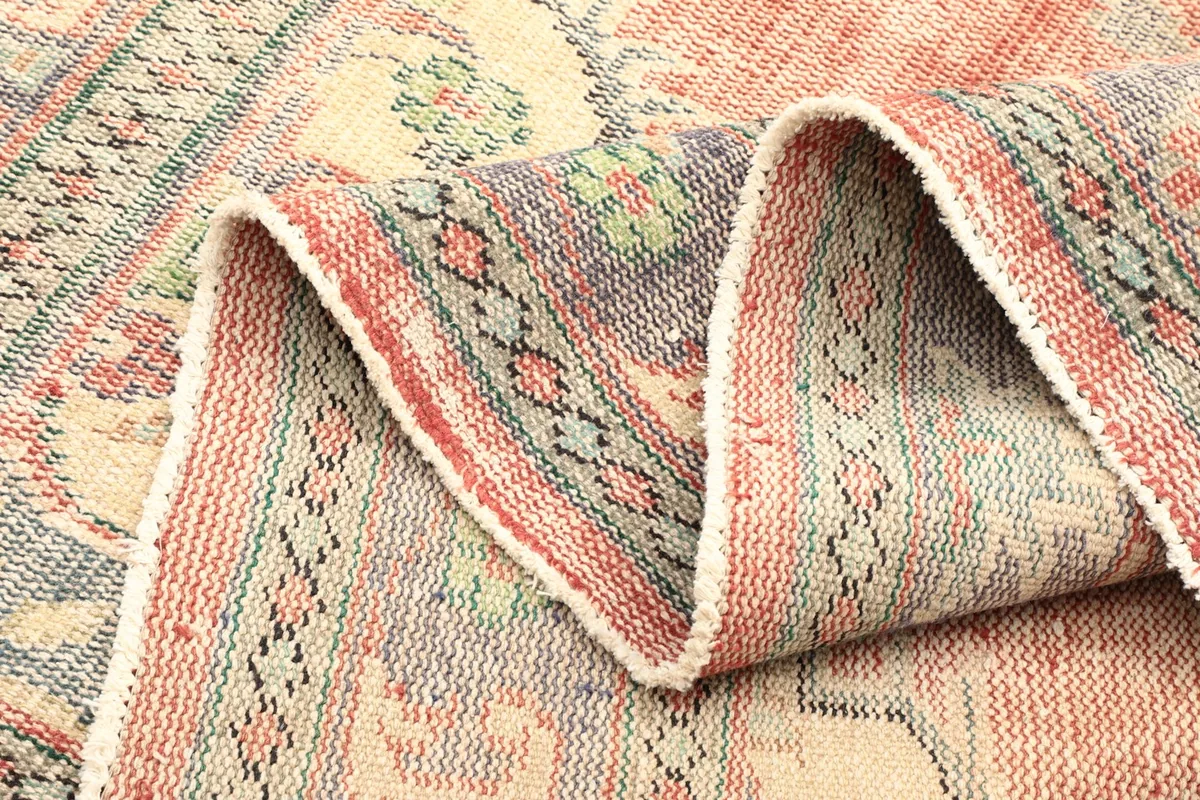 Folded section of the rug, showing the flexibility and construction of the weave