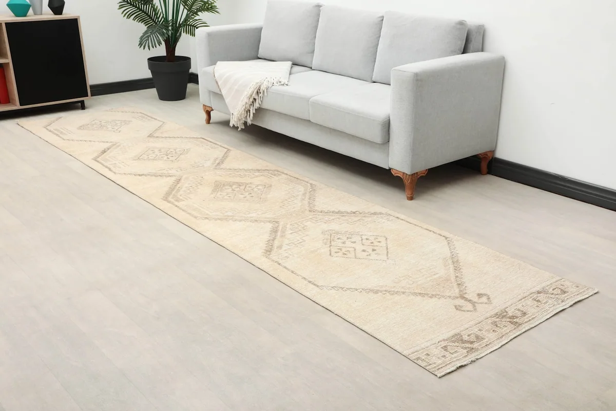 Overhead view of the runner in a room setting, showing its length and geometric design.
