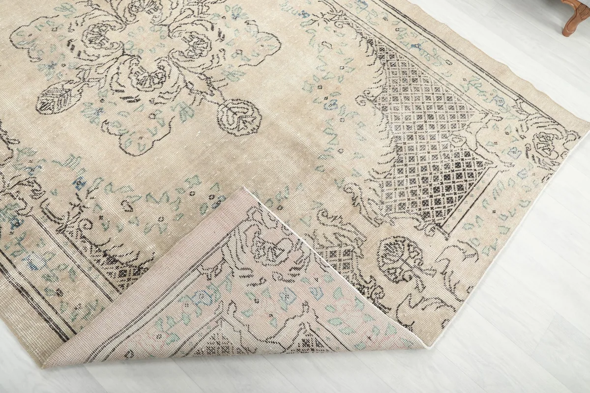 View of the back of the hand-knotted wool pile on cotton foundation, showing craftsmanship