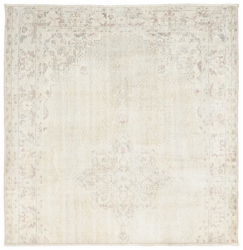 Full top view of the 5'10" x 5'11" ivory rose medallion Anatolian area rug