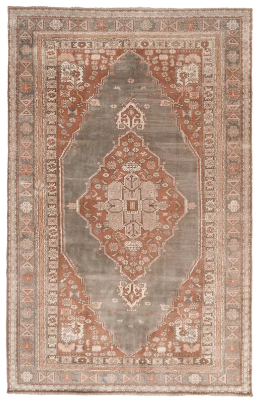 Full overhead view of the gray and rust vintage Anatolian area rug