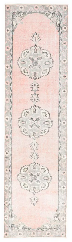 Full top view of the 3'0" x 11'5" rose and gray vintage Anatolian runner rug on a white background.