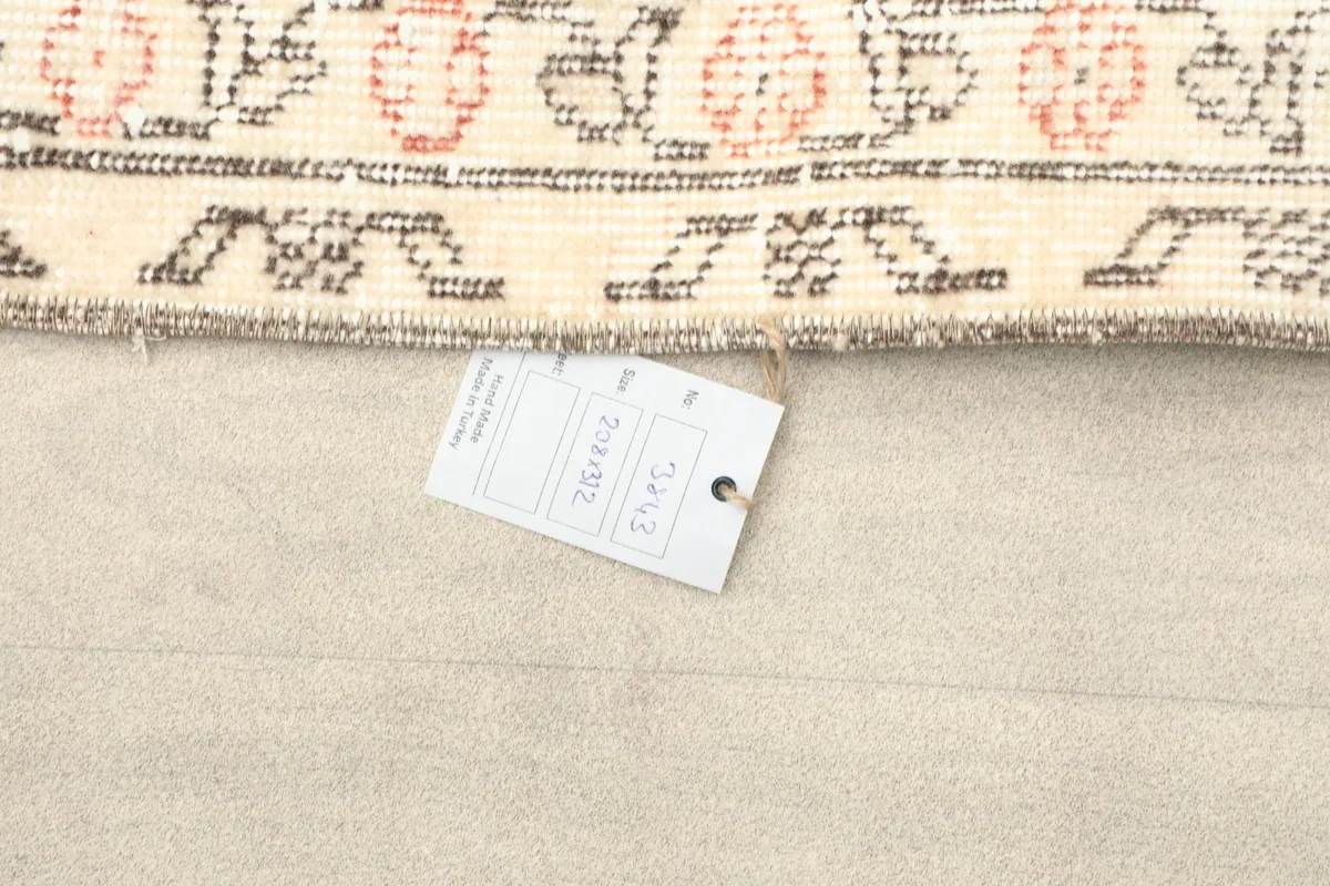Product tag attached to the rug, displaying item information