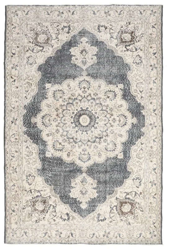 Full overhead view of the charcoal and ivory vintage Anatolian rug
