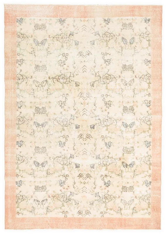 Full overhead view of the 7'1" x 10'1" cream and rust vintage Anatolian rug