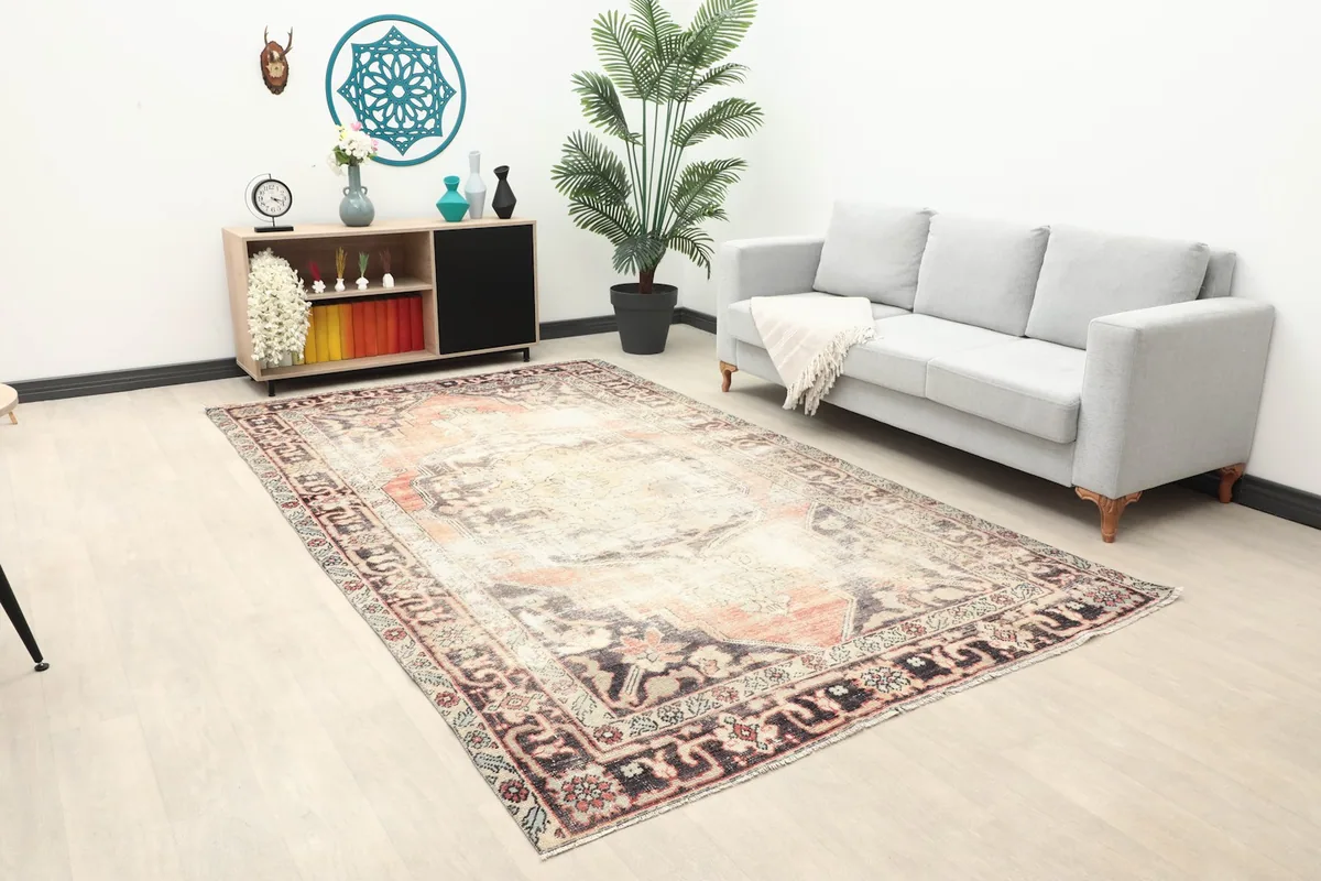 Wide angle view of the large vintage rug complementing a modern living space