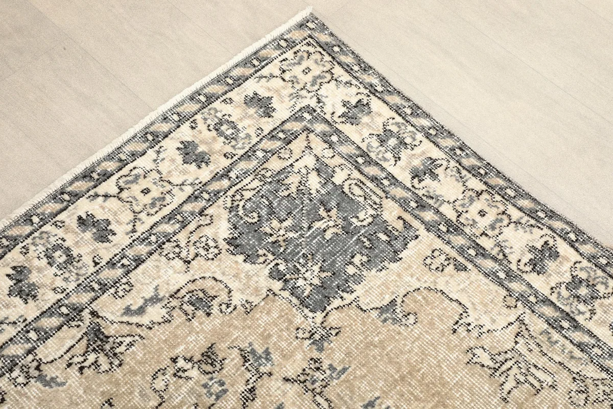 Corner detail showing the medallion motif and border pattern
