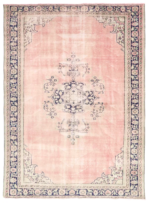 Full top view of the 7x10 vintage Anatolian rug with a rose field and navy medallion