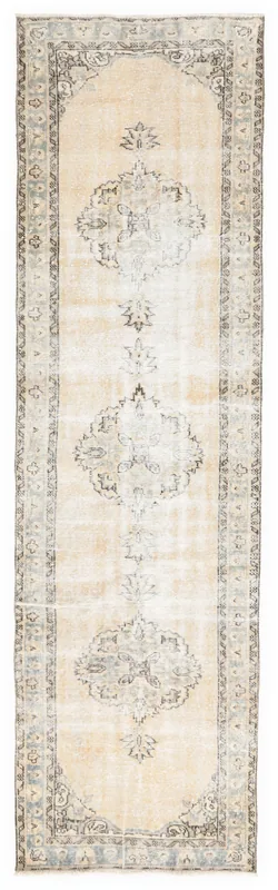 Full top view of the 3'0" x 10'8" beige and gray vintage Anatolian runner rug on a white background.