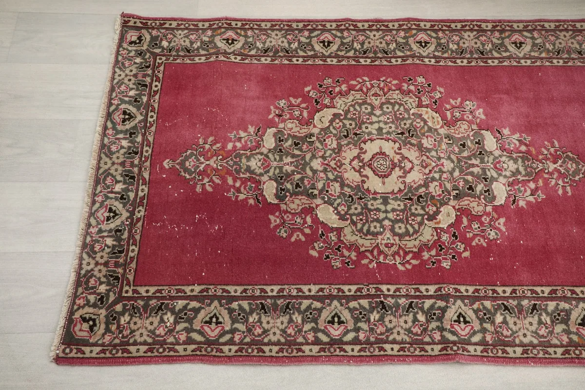 Another close-up showing the intricate patterns and colors of the runner rug's medallion