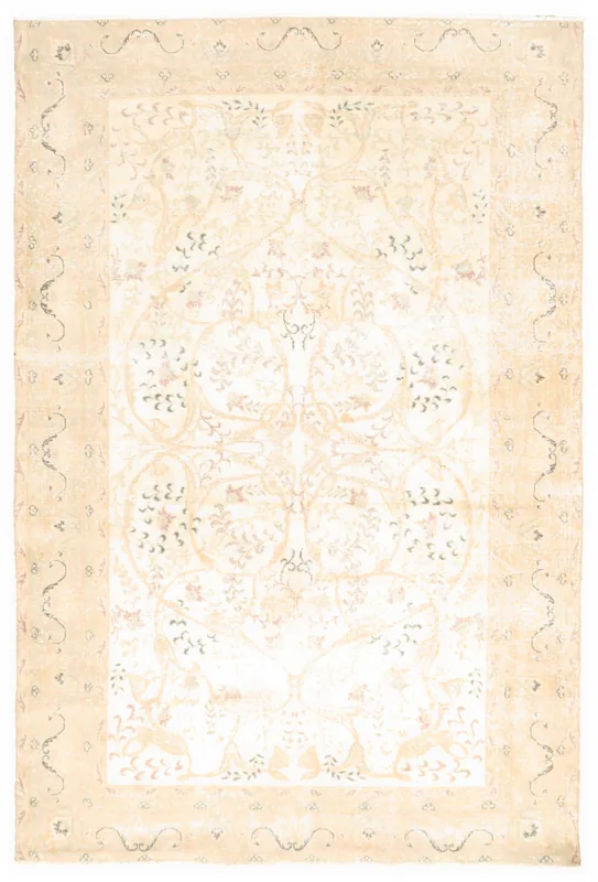 Full overhead view of the ivory and beige vintage Anatolian area rug on a white background.