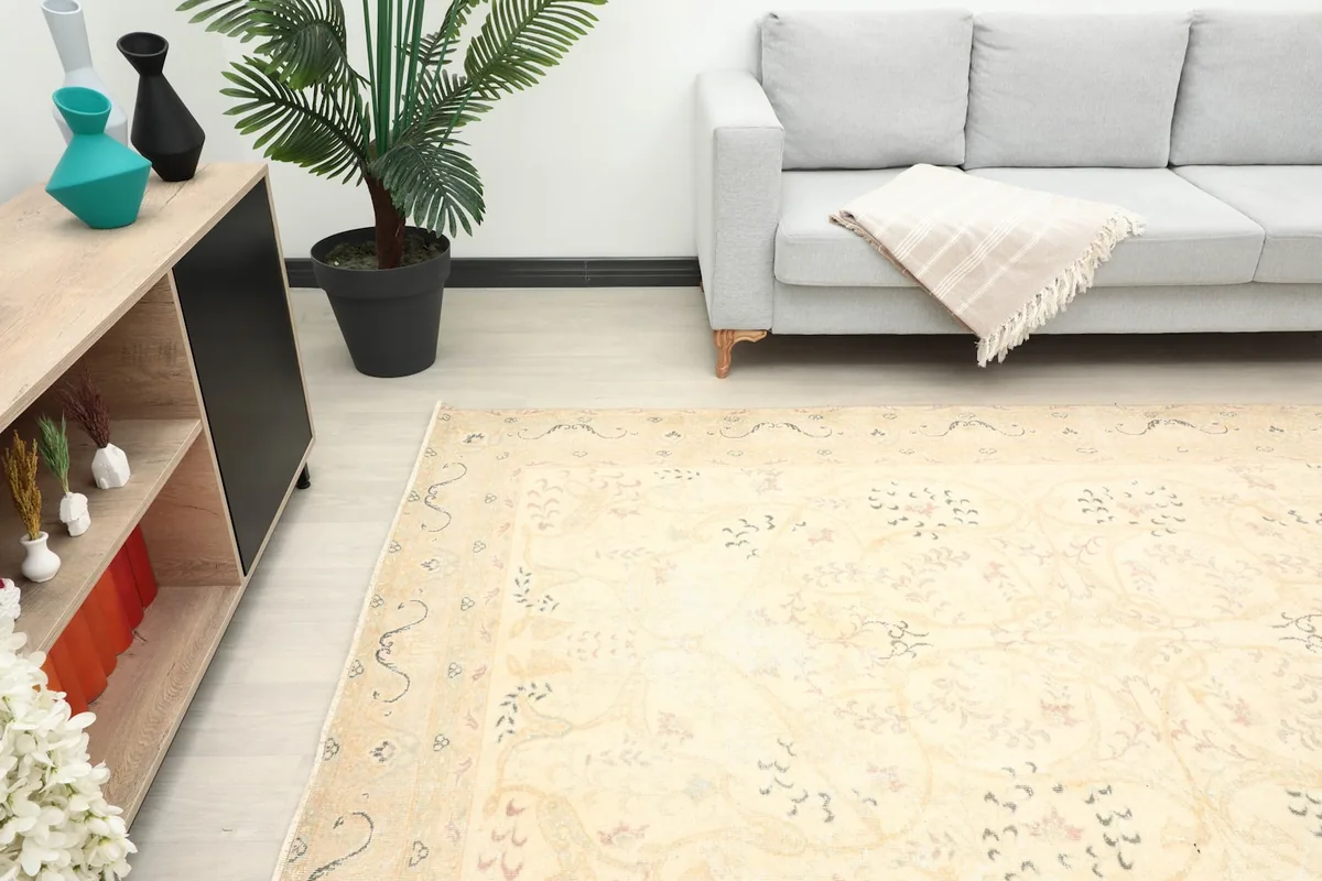 Angle view of the ivory rug in a living space, showcasing its blend with modern decor.