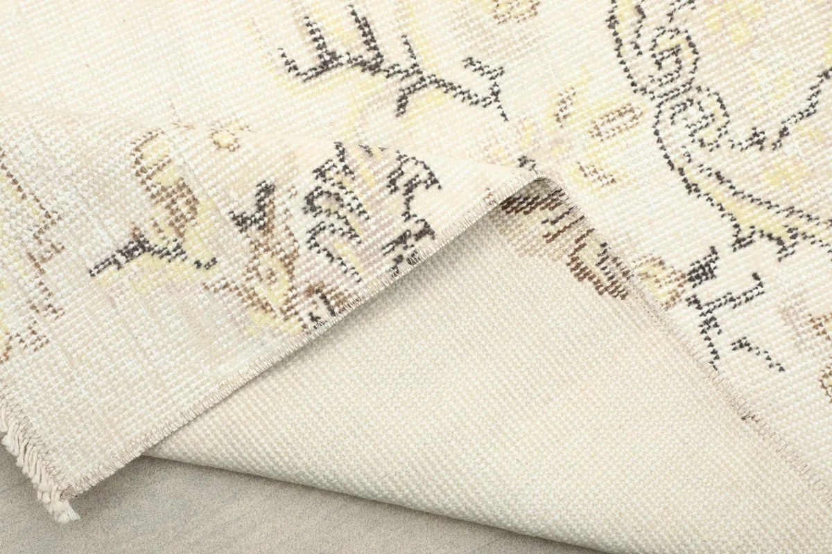 Back of the rug, showing the hand-knotted cotton foundation