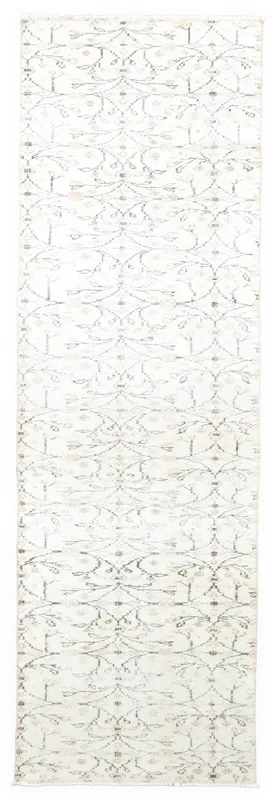 Full overhead view of the ivory botanical Anatolian runner rug on a white background.