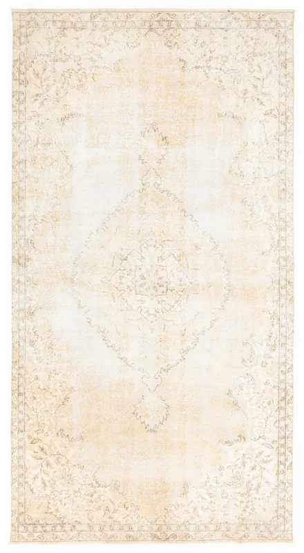 Full overhead view of the 5'1" x 9'5" cream vintage Anatolian area rug