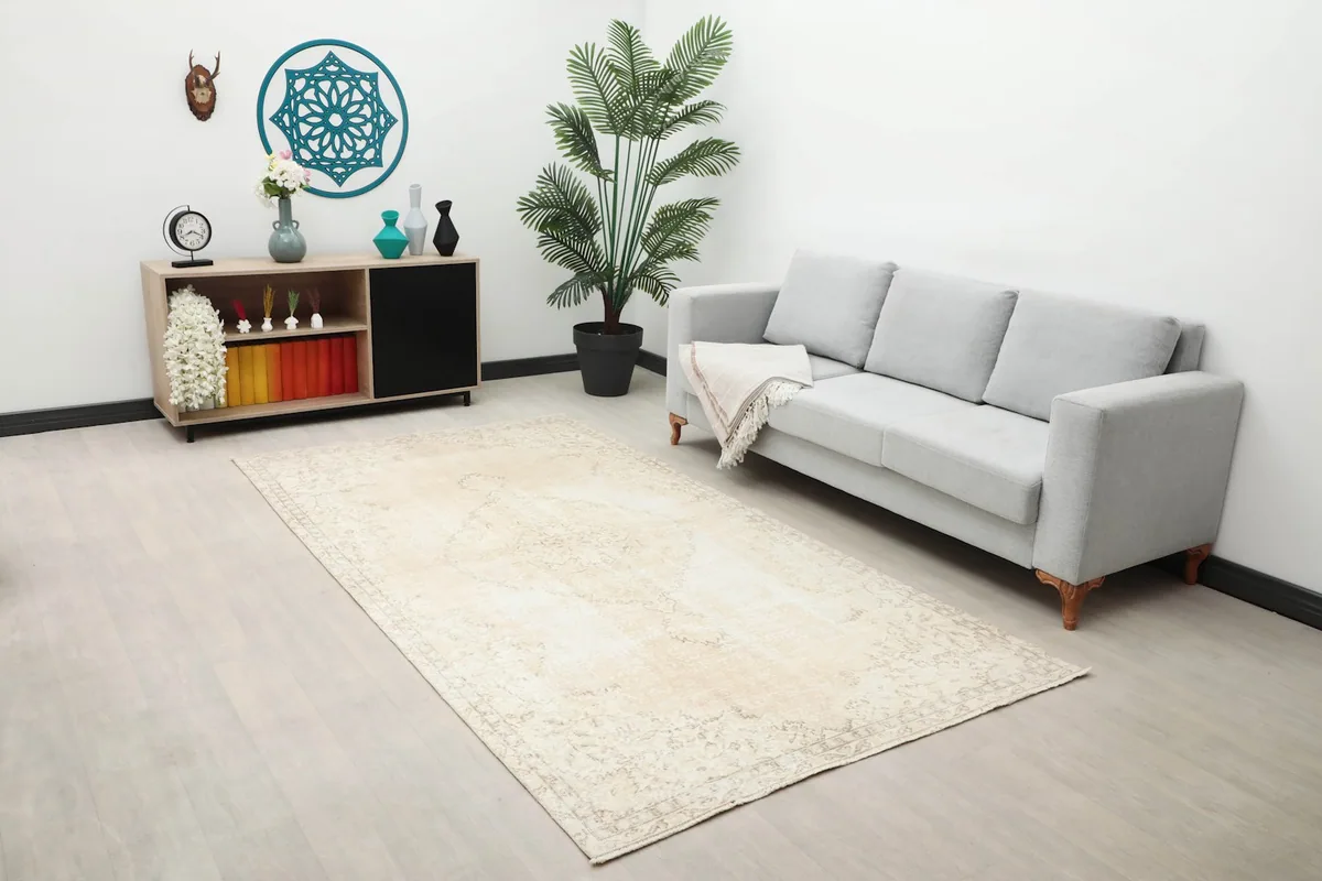 Full room view of the cream Anatolian rug complementing modern decor
