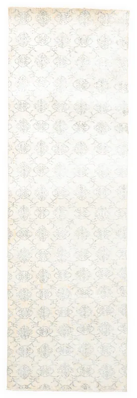 Full overhead view of the ivory and blue floral vintage runner on a white background.