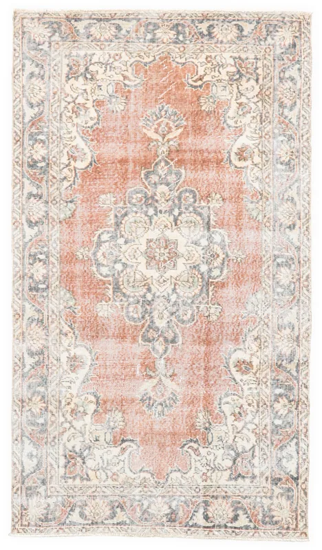 Full overhead view of the rust and ivory vintage Anatolian area rug