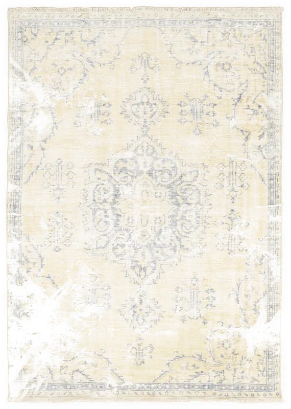 Full top view of the beige and gray vintage Anatolian area rug on a white background
