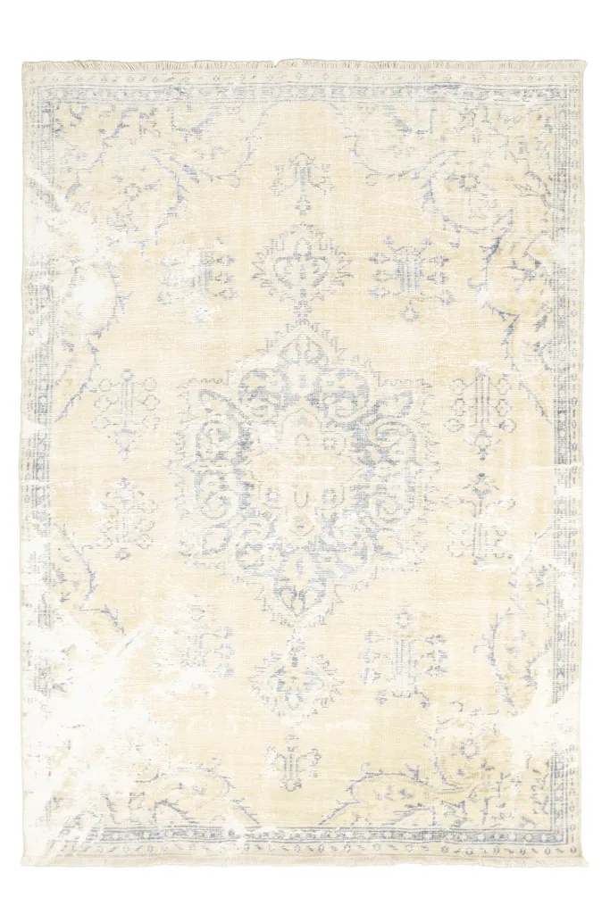 Overhead view of the 6x8 vintage rug, showing the full design and faded colors