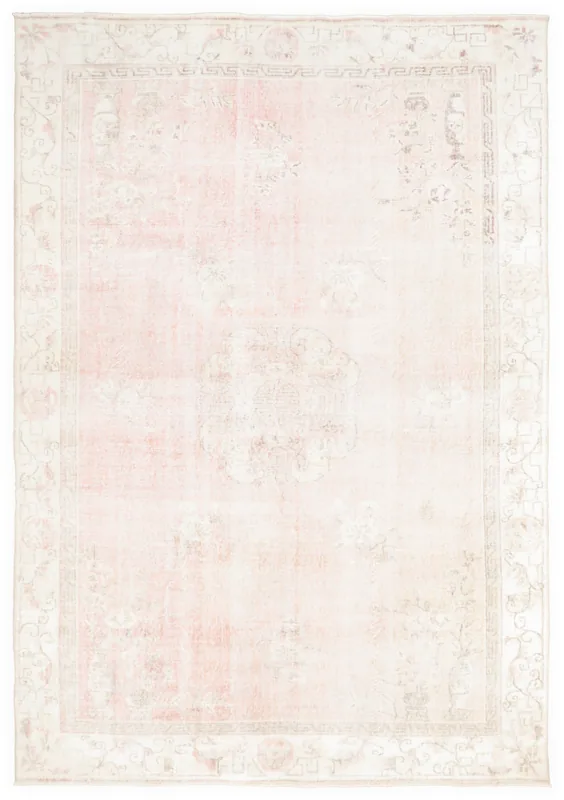 Full top view of a vintage rose and beige Anatolian area rug with faded motifs.
