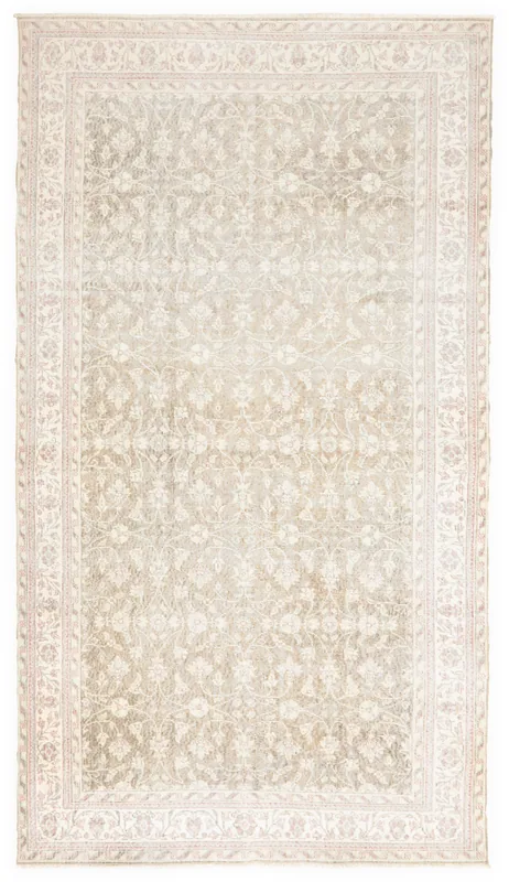Full overhead view of the beige and rose floral vintage Anatolian rug