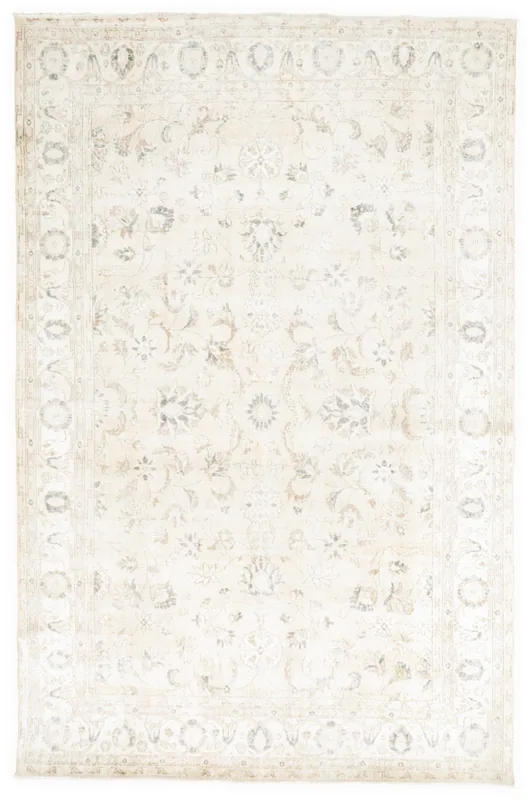 Full overhead view of the 7x10 ivory vintage Anatolian area rug on a white background.