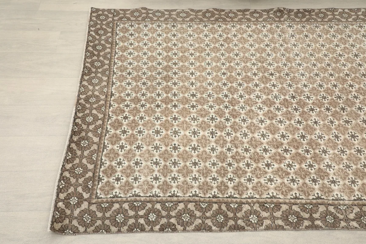 Corner angle view highlighting the geometric motifs and border design