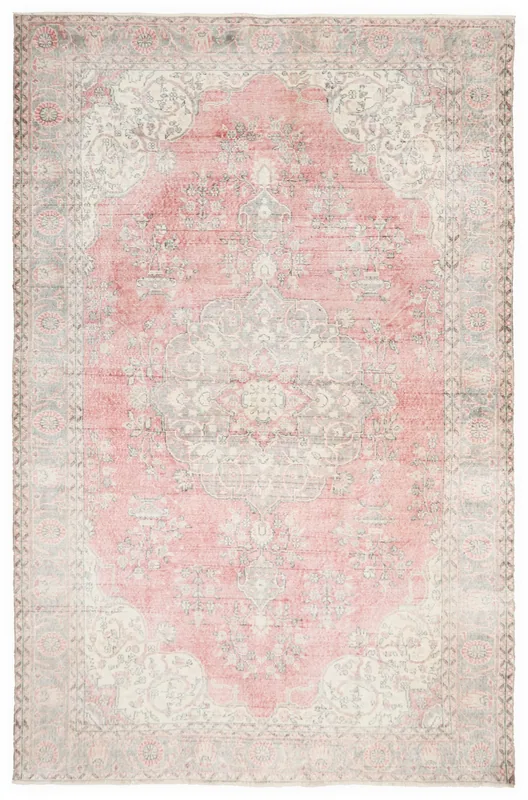 Full top view of the 7'1" x 10'11" vintage Anatolian area rug with rose, gray, and ivory colors