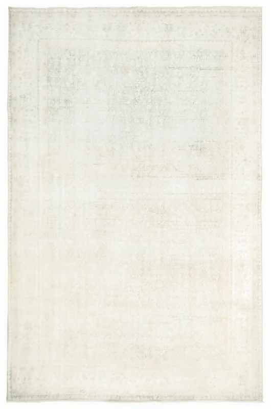 Full overhead view of the 7x10 ivory vintage Anatolian rug on a white background