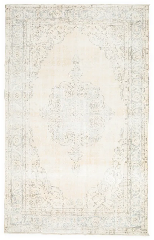Full overhead view of the 6'7" x 10'7" cream and blue vintage Anatolian rug on a white background.