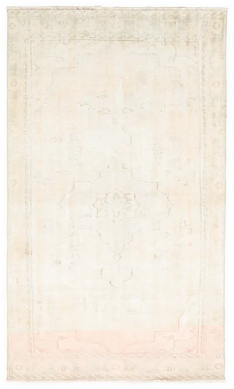 Full top view of the 5'3" x 9'1" ivory vintage Anatolian rug