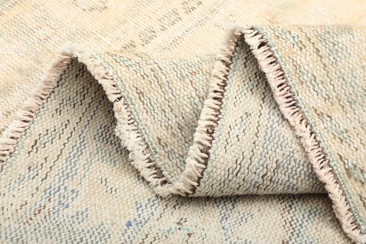 Close-up of a folded section showing the density of the hand-knotted wool