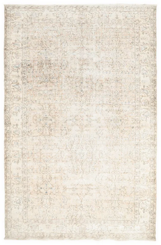 Full top view of the 6'3" x 9'8" ivory and tan vintage Anatolian floral rug on a white background.